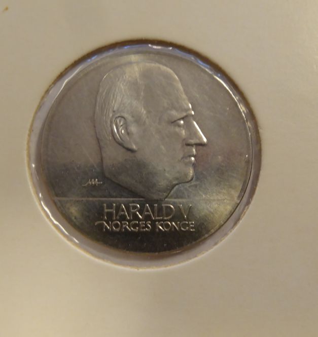 Hovedbilde 20 kr 1994 preget på en 1 Kr - rondell ved DKM