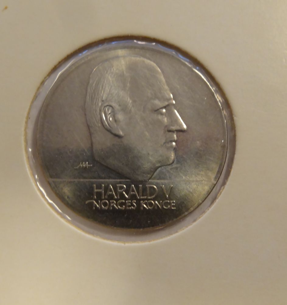 20 kr 1994 preget på en 1 Kr - rondell ved DKM
