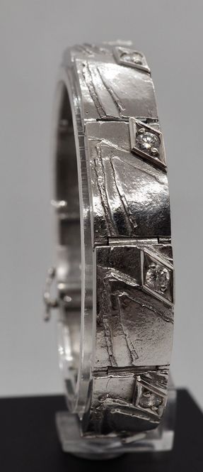 Hovedbilde Armbånd i 14 K hvitt gull med 10 diamanter
