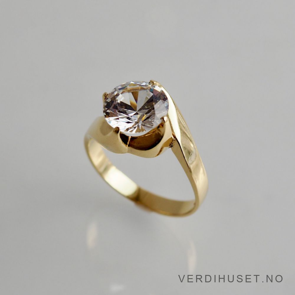 Ring i 18 K gull med blank sten