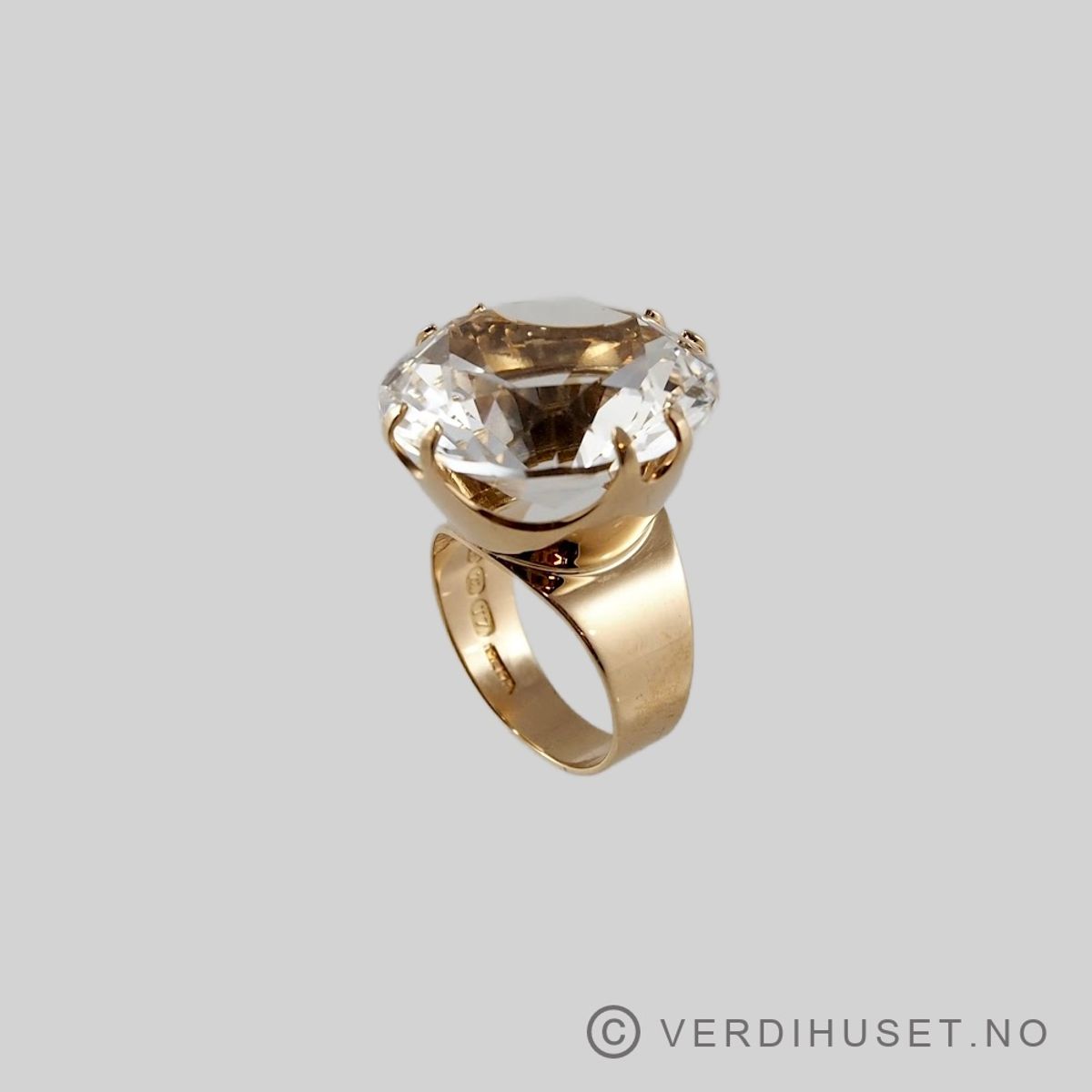 Ring i 14 K gull med stor blank sten