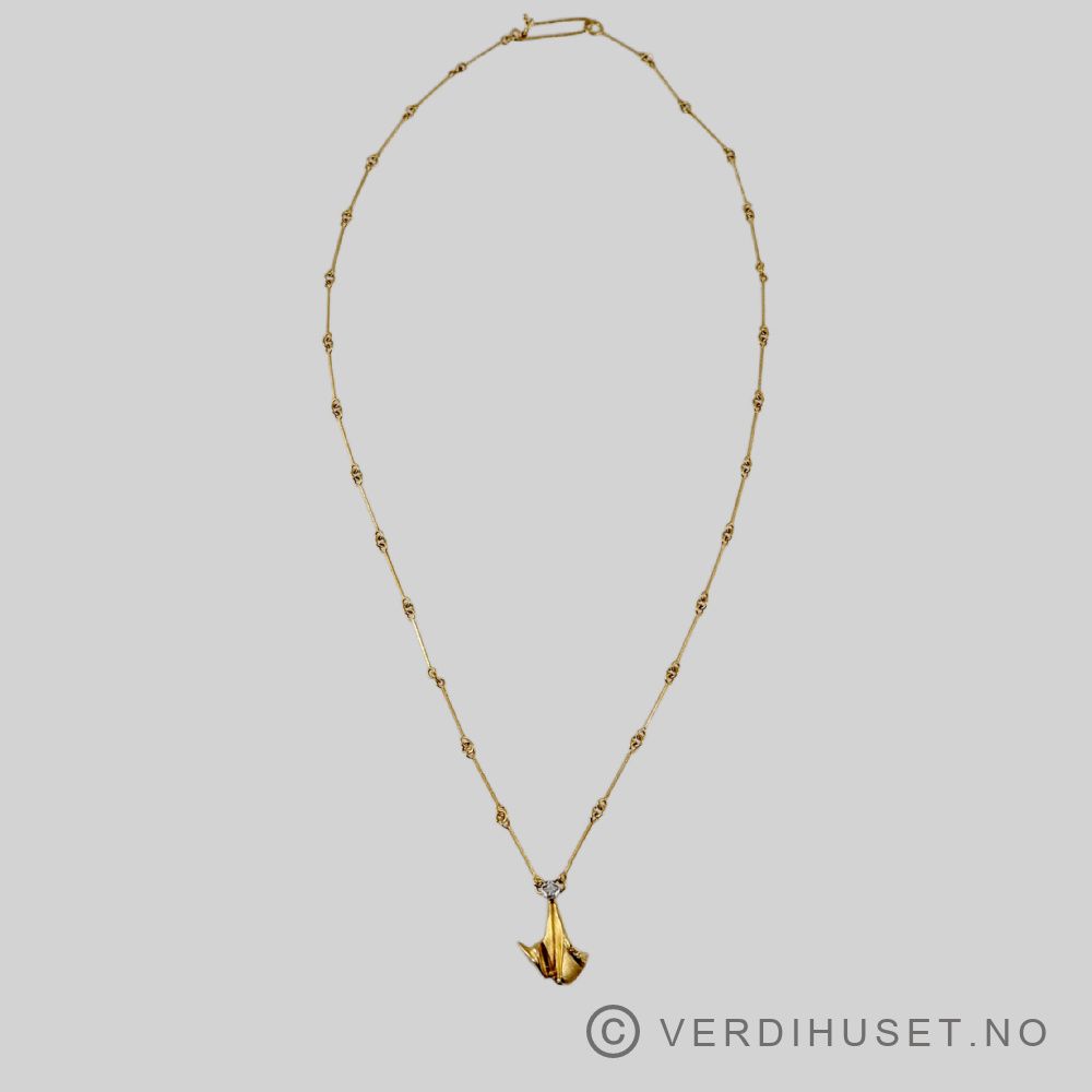 Halssmykke i 18 K gull med diamant