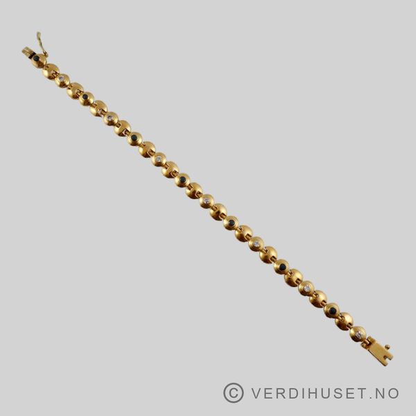 Hovedbilde Armbånd i 22 K gull med grå og blanke stener