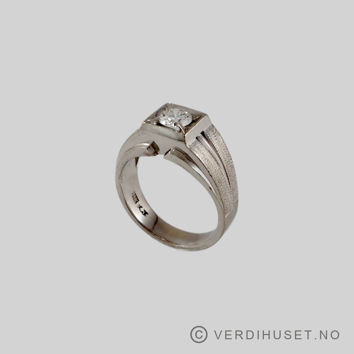 Ring i 14 K hvitt gull med blank sten