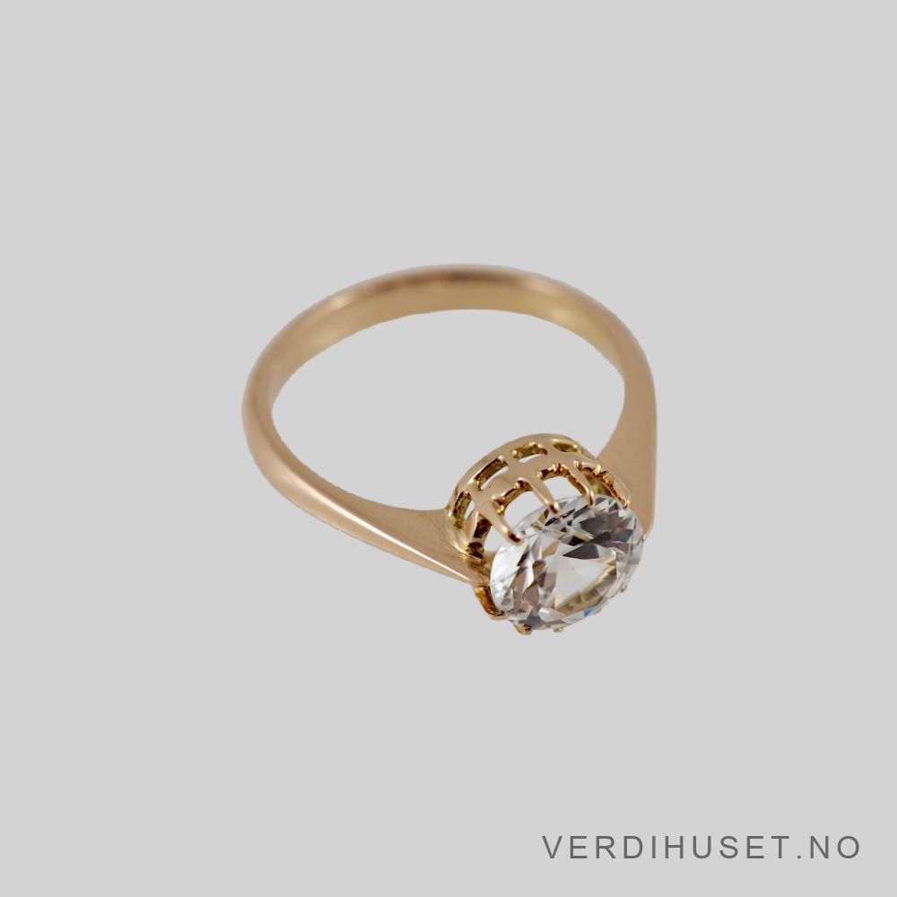 Ring i 18 K gull med blank sten